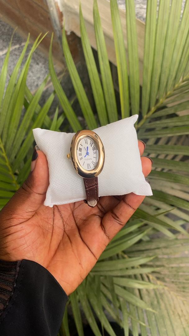 Gold Oval Watch with Brown Leather Strap