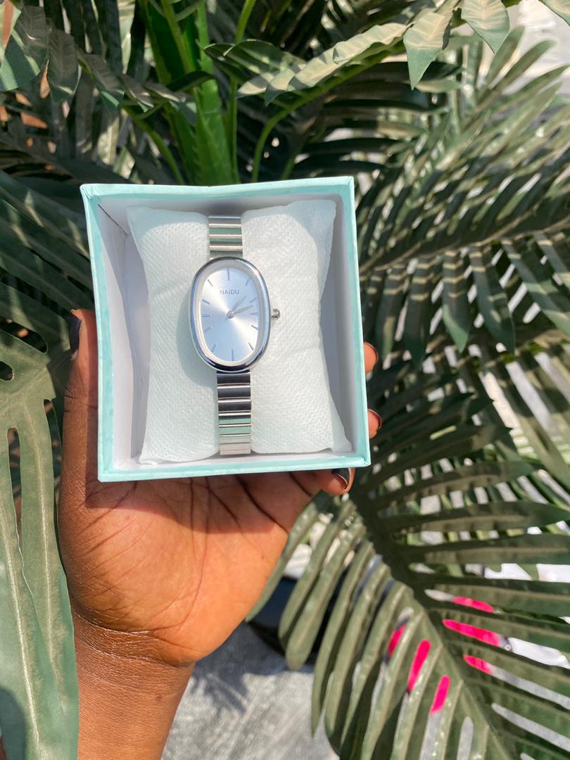 Gold Oval Watch with Green Leather Strap