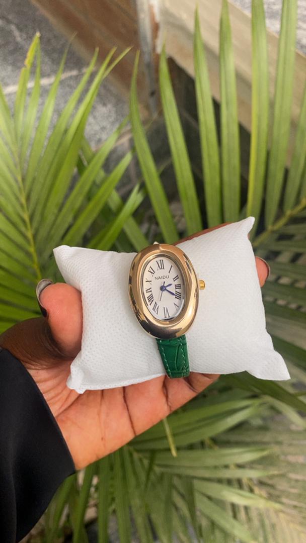 Silver Oval Watch with Black Leather Strap